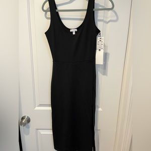 Fitted black dress with slit by Leith sz small